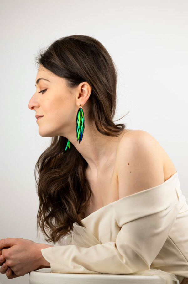 Green earrings with beetle wings