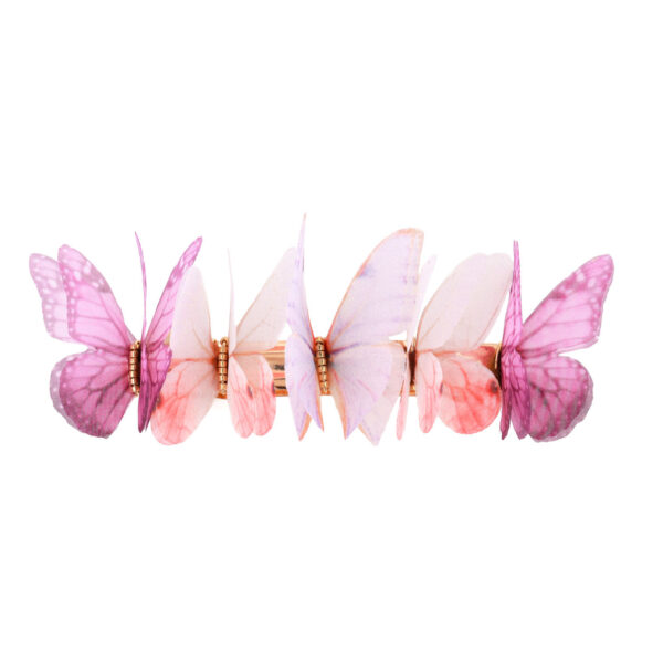 Hand-made silk butterfly hairclip using pure silk and a french barrette closure.